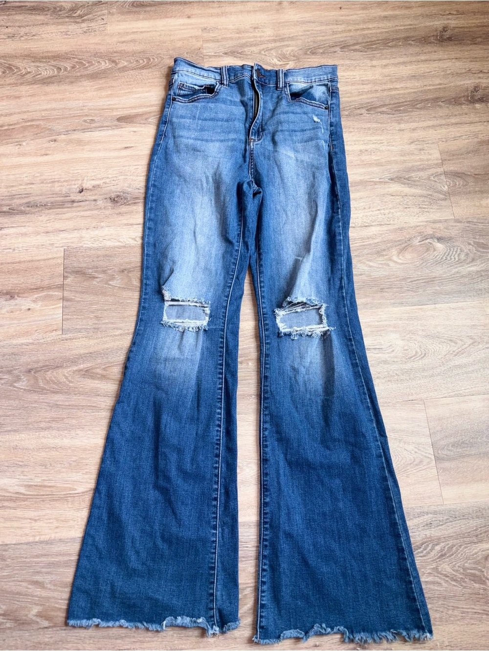 Medium Blue Distressed Flare Jeans. Size 11
